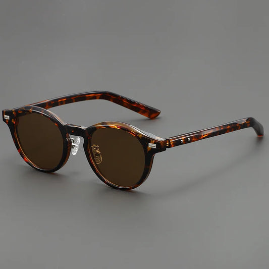 Gravenwald Quinn Ellipse Frame Sunglasses: UV Protected, Lightweight, Rivet Detail